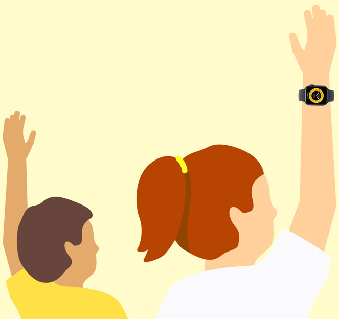 Des enfants lèvent la main dans une salle de classe. Ils ont une Apple Watch au poignet.