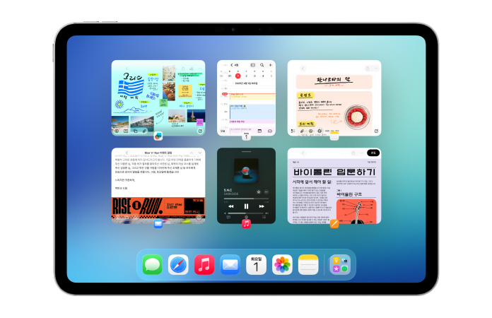 가로 방향의 iPad에 캘린더 앱, 메모 앱, Apple Music, Safari를 포함한 여섯 개의 윈도우가 두 줄로 열려 있는 모습