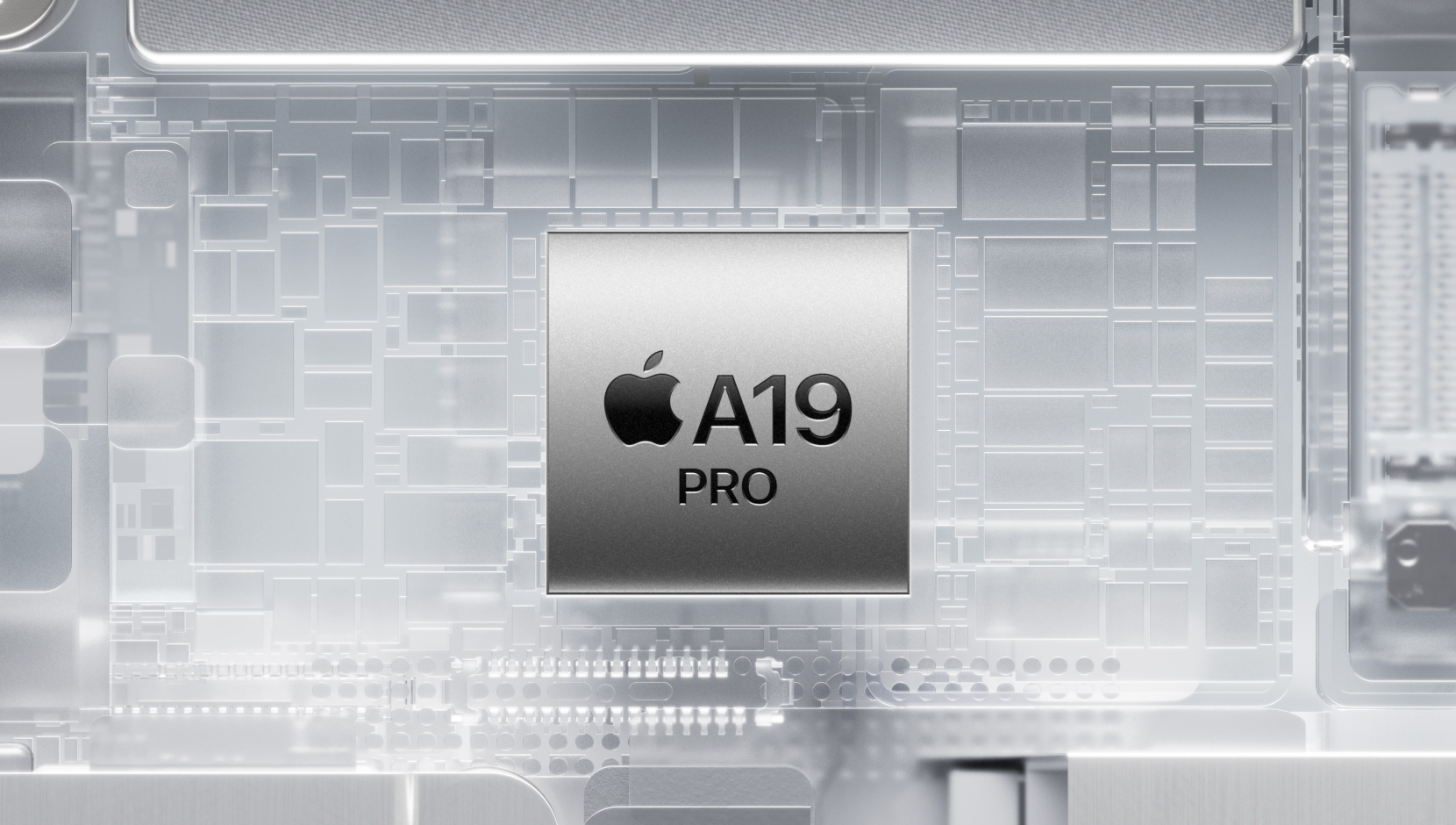 شريحة A19 Pro محاطة بمكونات iPhone الداخلية المتوهجة